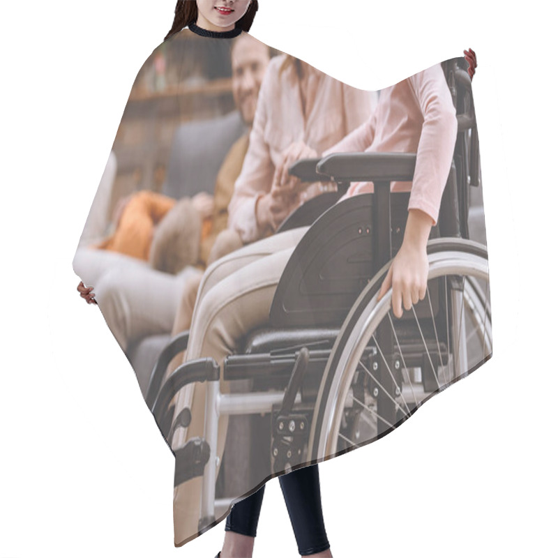 Personality  Cropped Shot Of Mother And Daughter In Wheelchair Holding Hands At Home Hair Cutting Cape