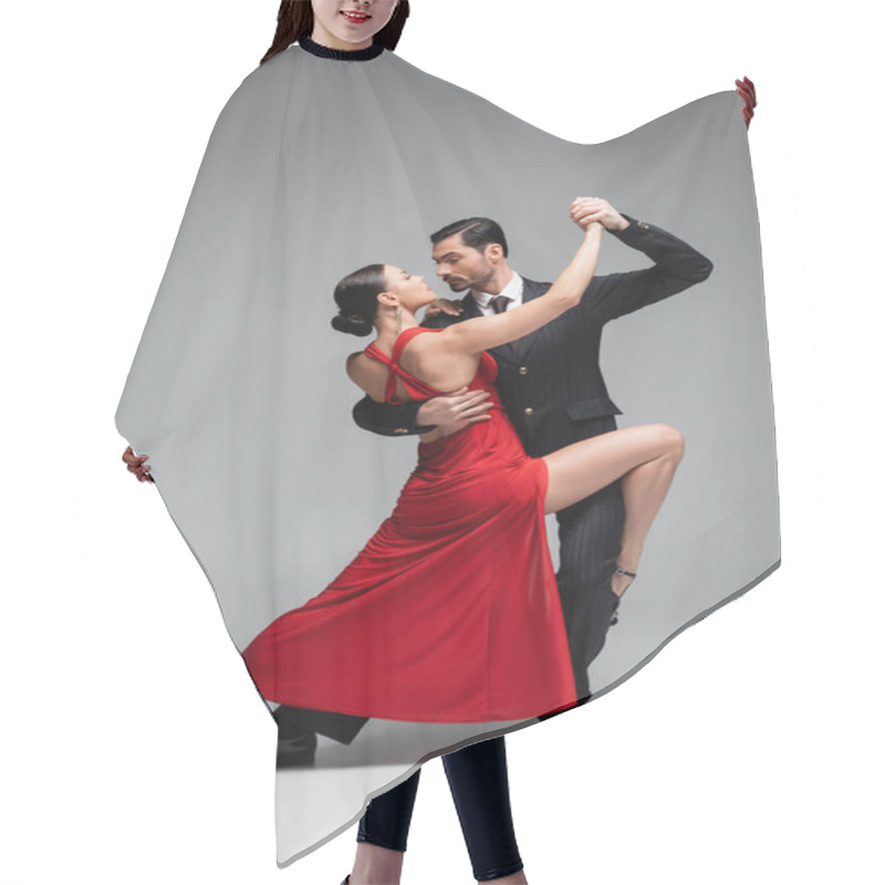 Personality  Full Length Of Elegant Couple Dancing Tango On Grey Background Hair Cutting Cape