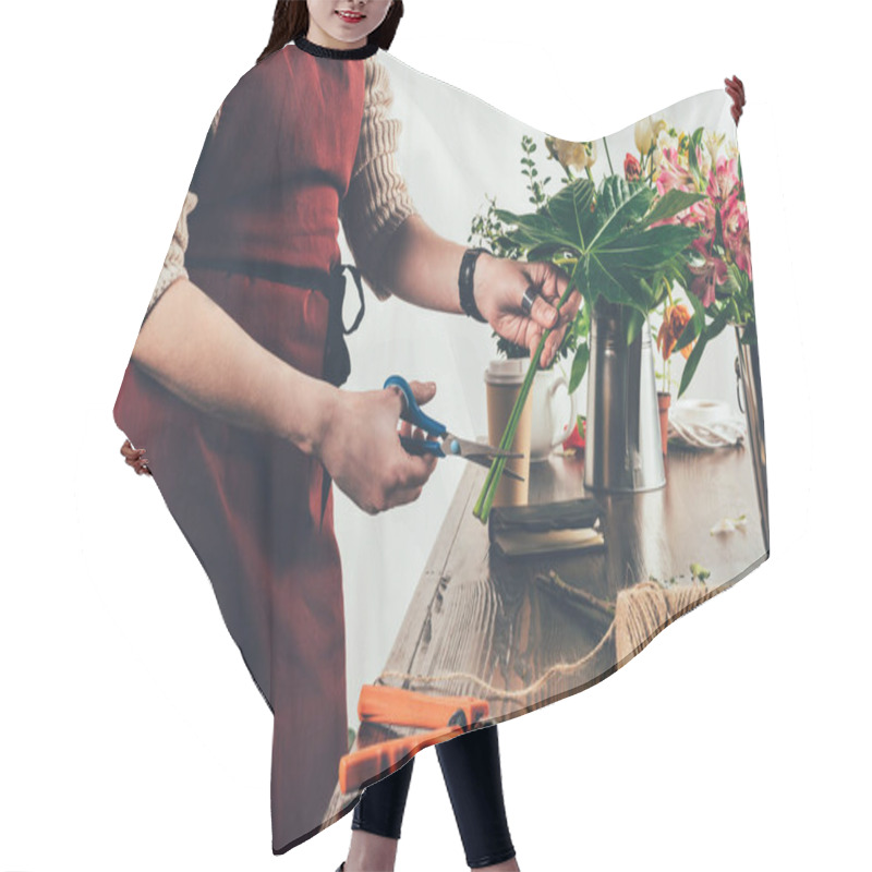 Personality  Cropped Image Of Florist Cutting Stalk Of Green Leaf With Scissors Hair Cutting Cape