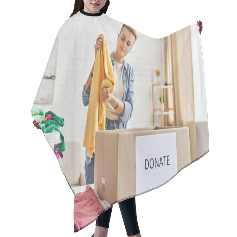 Personality  Young And Stylish Woman In Casual Clothes Standing With Yellow Jumper Near Plastic Container With Garments And Donation Box In Living Room, Sustainable Living And Social Responsibility Concept Hair Cutting Cape