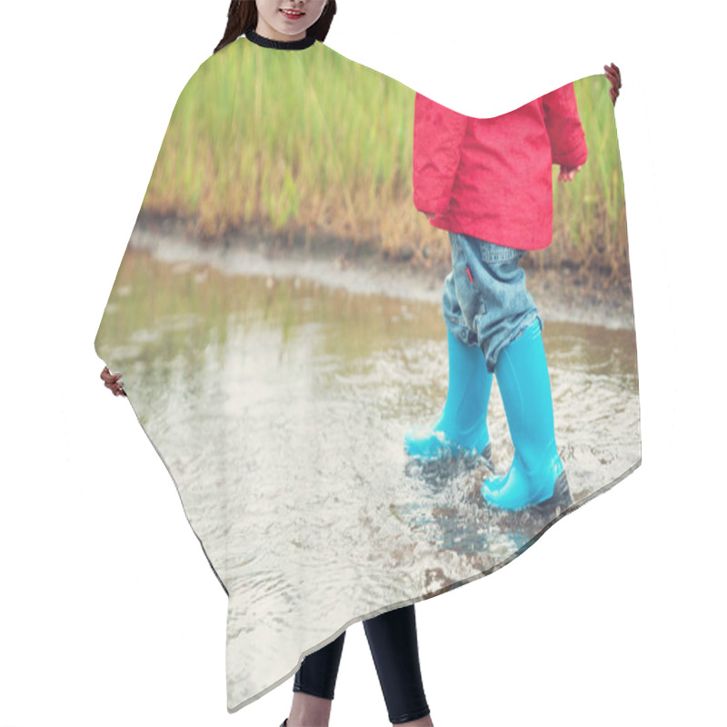 Personality  Child Walking In Wellies In Puddle On Rainy Weather. Boy Under Rain In Summer Hair Cutting Cape