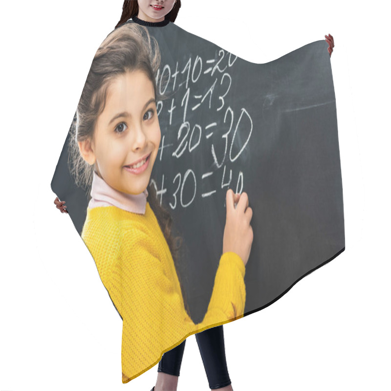 Personality  Smiling Schoolgirl Writing On Blackboard With Chalk And Looking At Camera Hair Cutting Cape