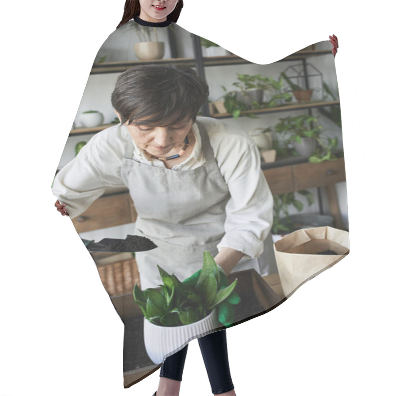 Personality  A Gardener Lovingly Cares For Her Plants In A Cozy Studio. Hair Cutting Cape