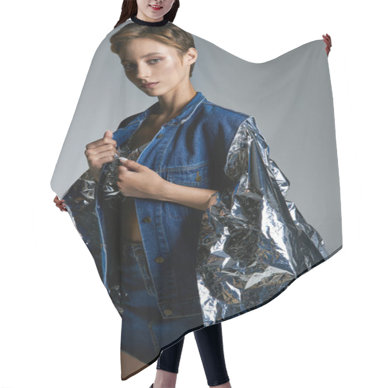 Personality  Young Woman Showcases Sustainable Fashion In Silver Foil Denim Jacket Hair Cutting Cape