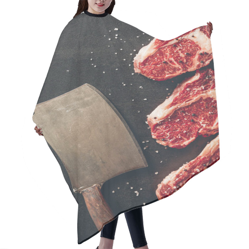 Personality  Top View Of Raw Meat Steaks And Cleaver On Surface In Kitchen  Hair Cutting Cape