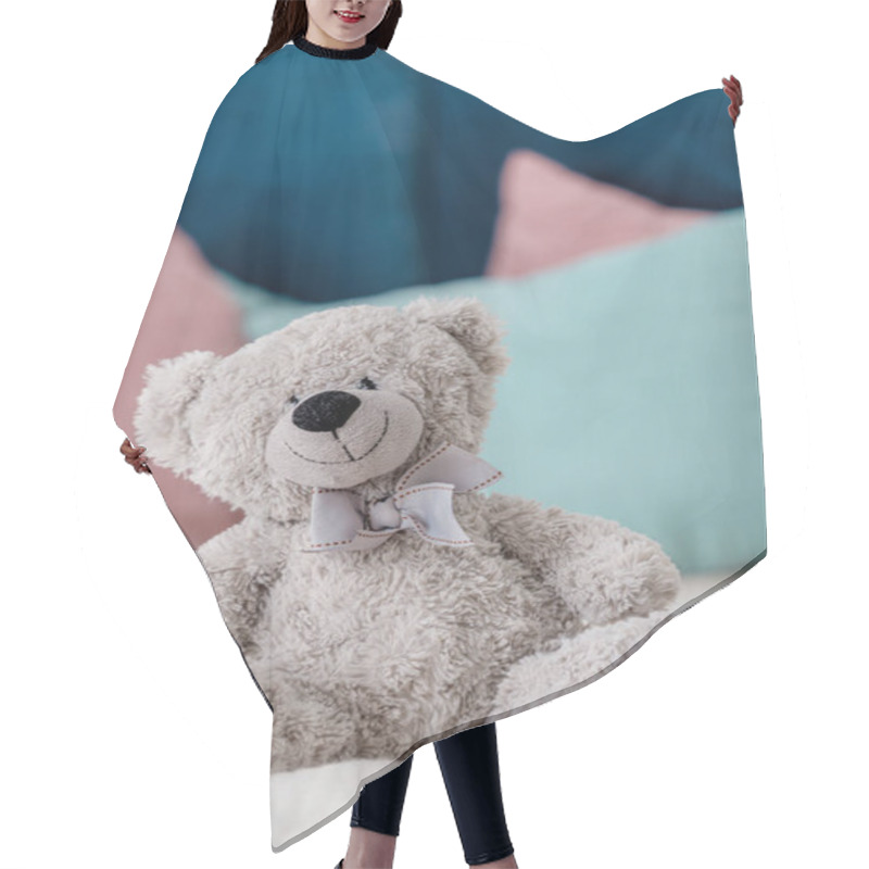 Personality  Close Up Vertical View Of Teddy Bear Sitting On The Bed With Pillows On Background Hair Cutting Cape