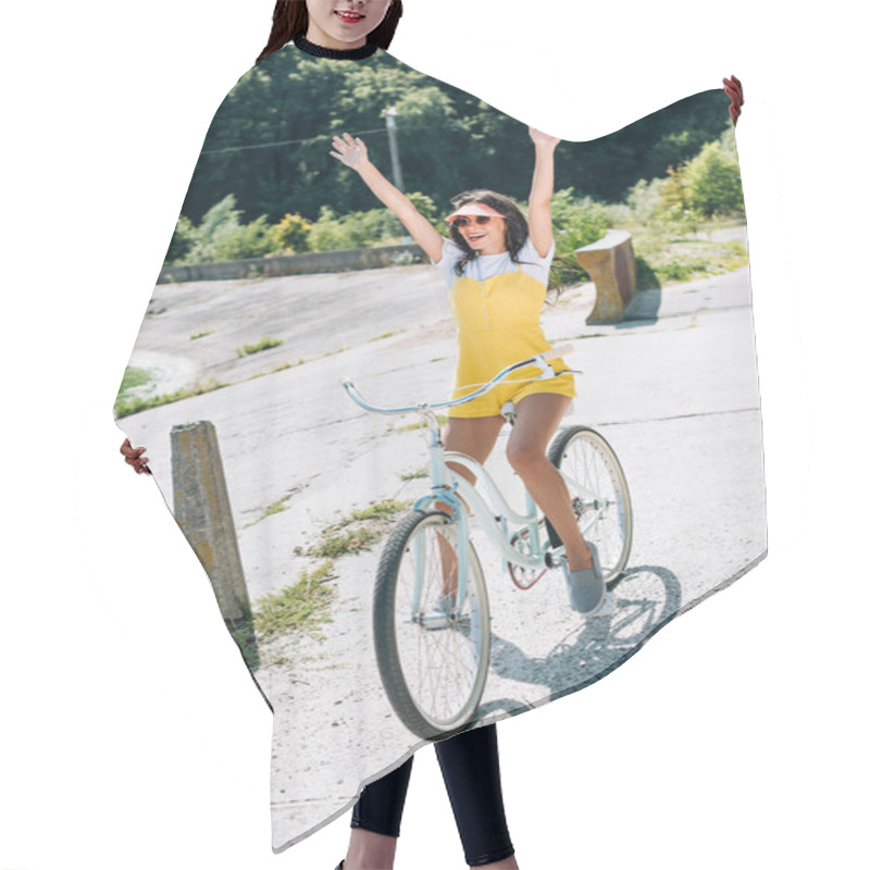 Personality  Brunette Girl Riding Bike With Hands In Air In Summer Hair Cutting Cape