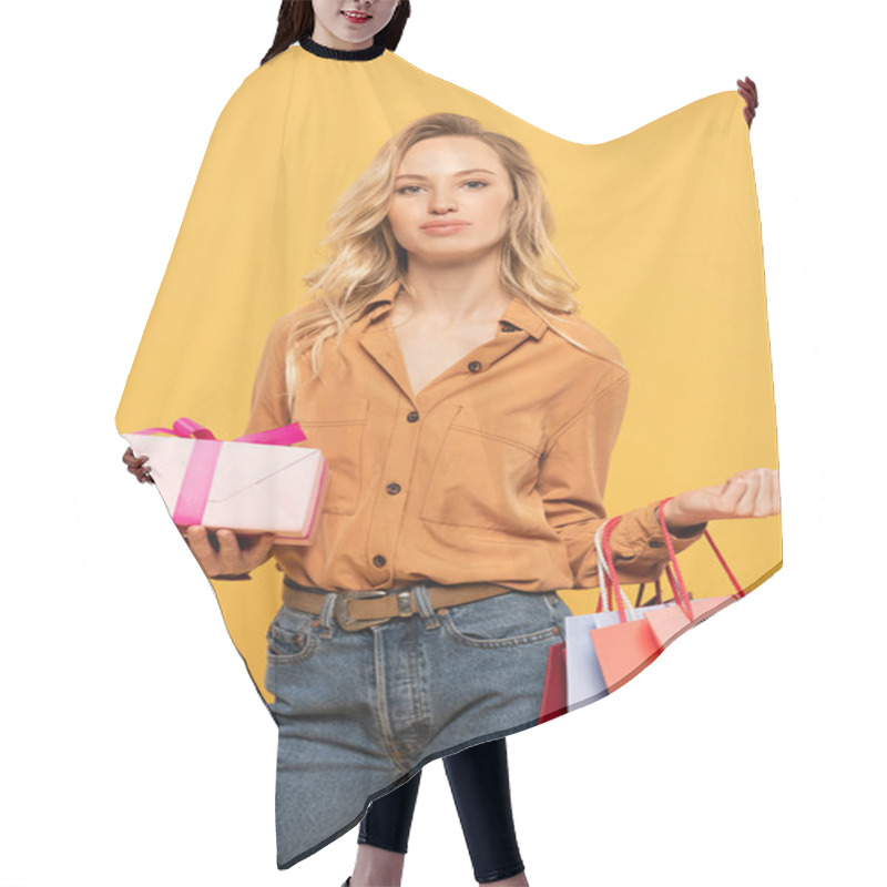 Personality  Blonde Woman Holding Gift Box And Shopping Bags Isolated On Yellow Hair Cutting Cape