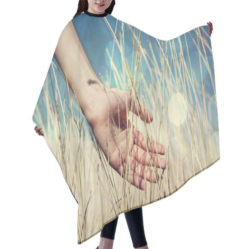 Personality  Hand In Autumn Grass. Hair Cutting Cape