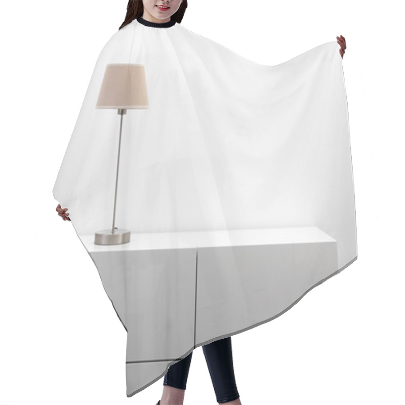 Personality  White Commode With Table Lamp In Bright Minimalism Interior Hair Cutting Cape