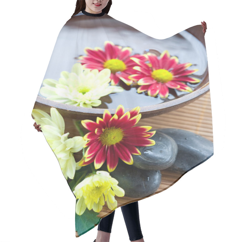 Personality  Spa Setting With Hot Stones With Chrysanthemum And Bowl Of Water. Hair Cutting Cape