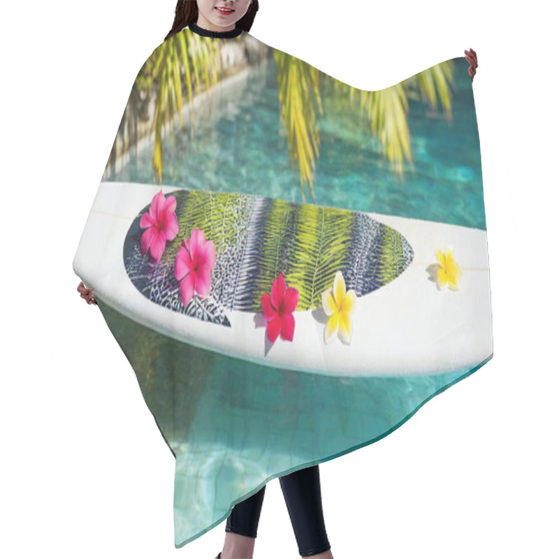 Personality  A Surfboard Floating Upright In The Air With Tropical Flowers And Sunlight Beams In The Background. Hair Cutting Cape