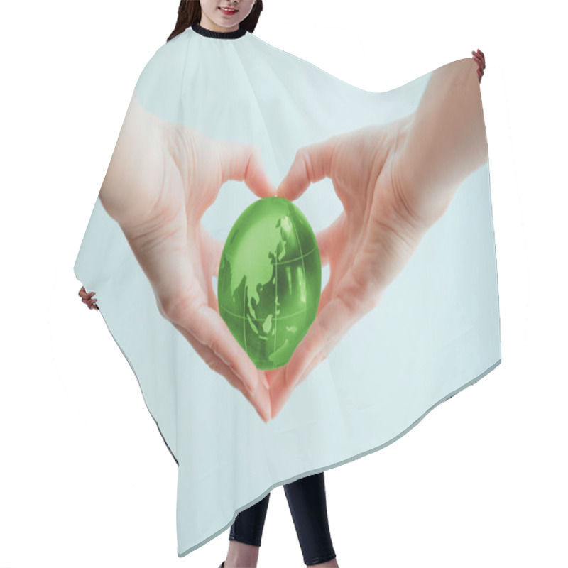 Personality  Hands In Shape Of Heart  Holding Green Glass Globe Of Indoneasia Hair Cutting Cape