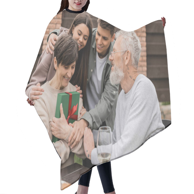 Personality  Cheerful Middle Aged Man And Children Hugging Woman With Gift Box Near Summer Food During Barbeque Party And Parents Day Celebration At Backyard In June, Celebrating Parenthood Day Concept Hair Cutting Cape