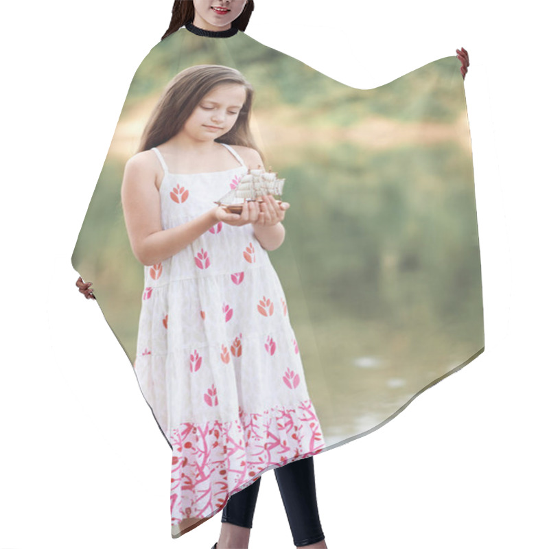 Personality  Girl Playing With A Toy Sailing Ship By The River Hair Cutting Cape