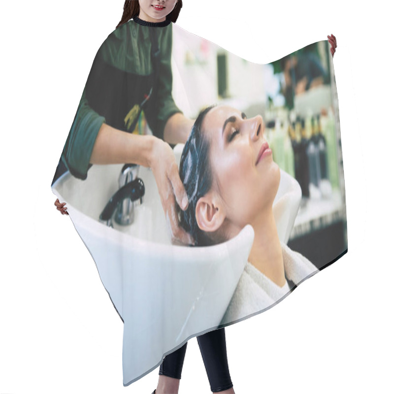 Personality  Hairdresser Washing Head Her Client. Woman In A Hair Salon Hair Cutting Cape