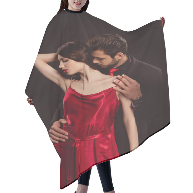 Personality  Handsome Man Embracing And Taking Off Red Dress From Beautiful Woman Isolated On Black Hair Cutting Cape