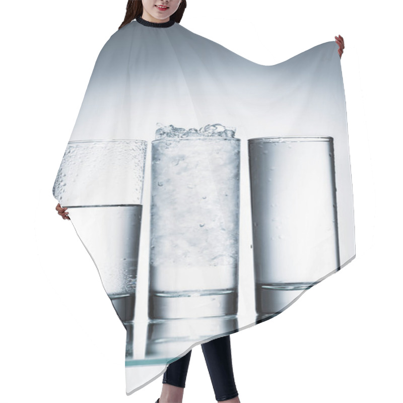 Personality  Glasses Of Water In Row And One With Ice On Reflective Surface Hair Cutting Cape