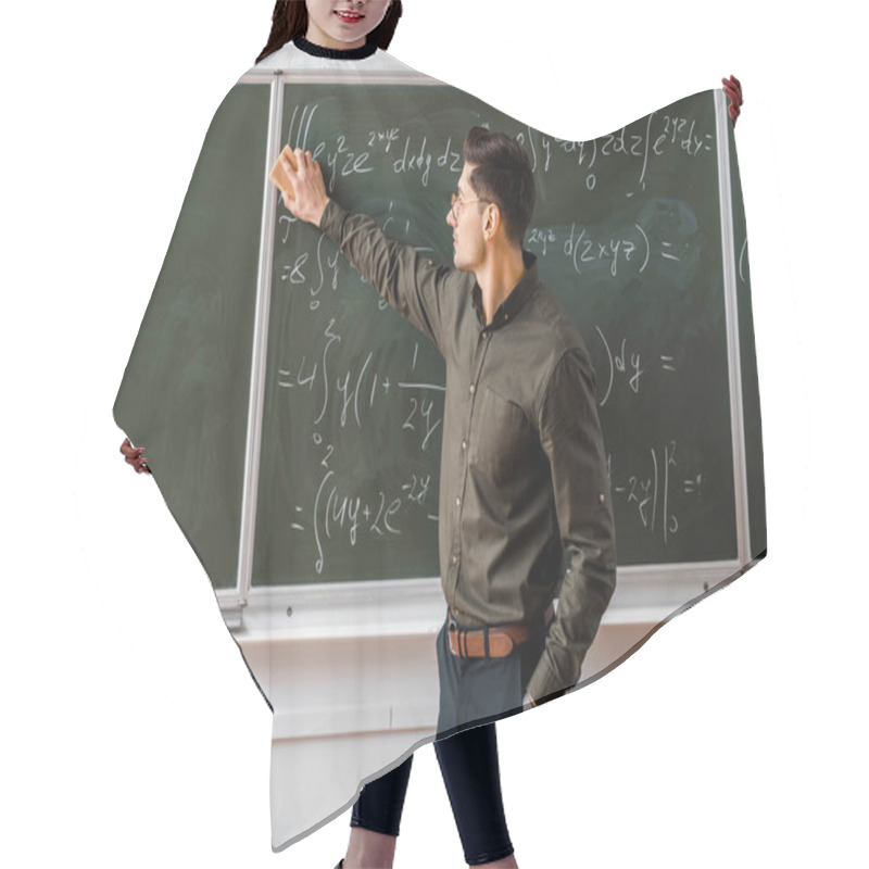 Personality  Male Teacher In Formal Wear Wiping Mathematical Equations With Sponge In Classroom Hair Cutting Cape