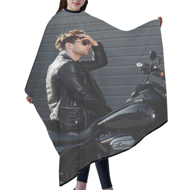 Personality  Handsome Young Man Sitting On Motorcycle And Readjusting Hair  Hair Cutting Cape