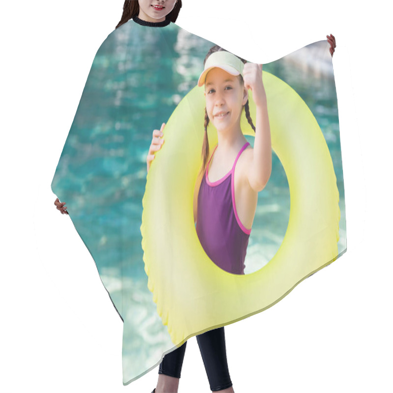 Personality  Girl In Swimwear And Sun Visor Cap Showing Thumb Up While Holding Swim Ring Near Pool Hair Cutting Cape