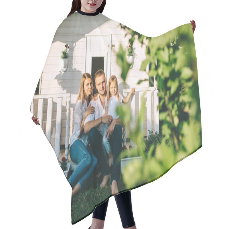 Personality  Smiling Family With Little Child Sitting Together On Porch Of Little Country House Hair Cutting Cape