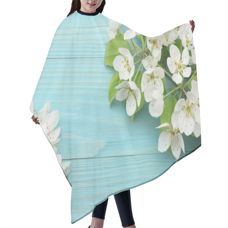 Personality  Spring Background With White Flowers Blossoms On Blue Wooden Background. Top View Hair Cutting Cape