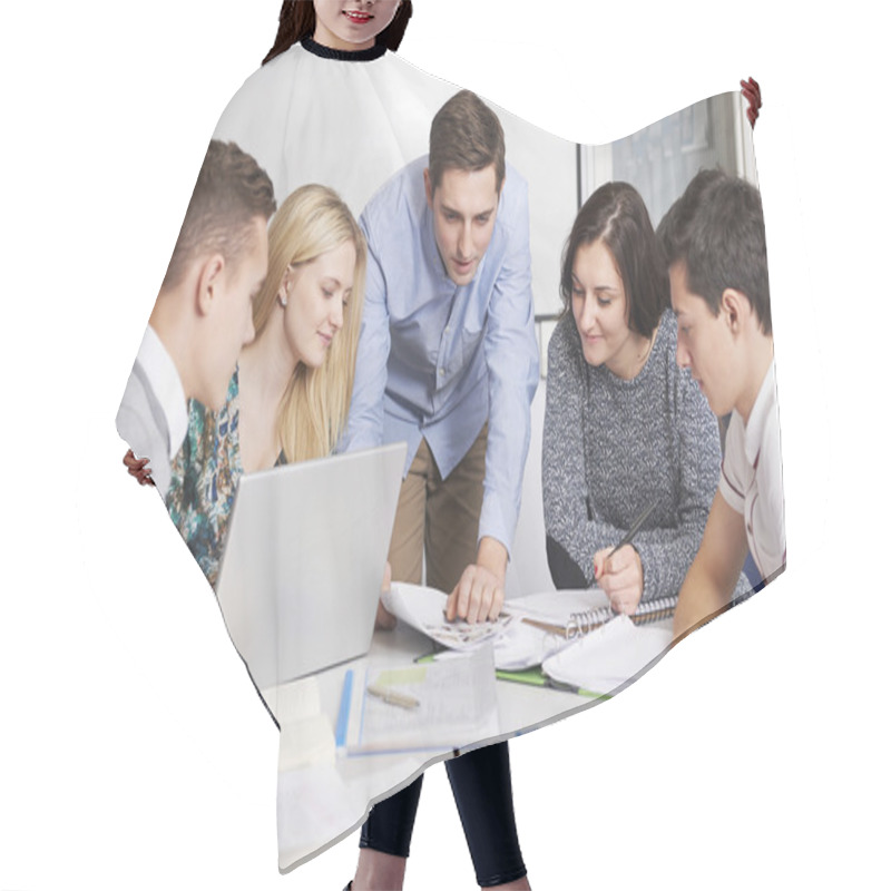 Personality  Teacher Working In Classroom With Students Hair Cutting Cape