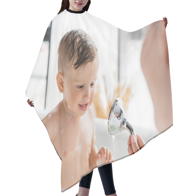 Personality  Blurred Mother Holding Shower Head And Bathing Toddler Son  Hair Cutting Cape