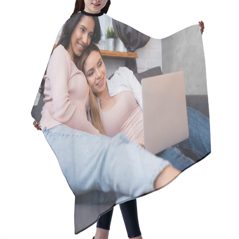 Personality  Happy Lesbian Couple Watching Movie On Blurred Laptop  Hair Cutting Cape