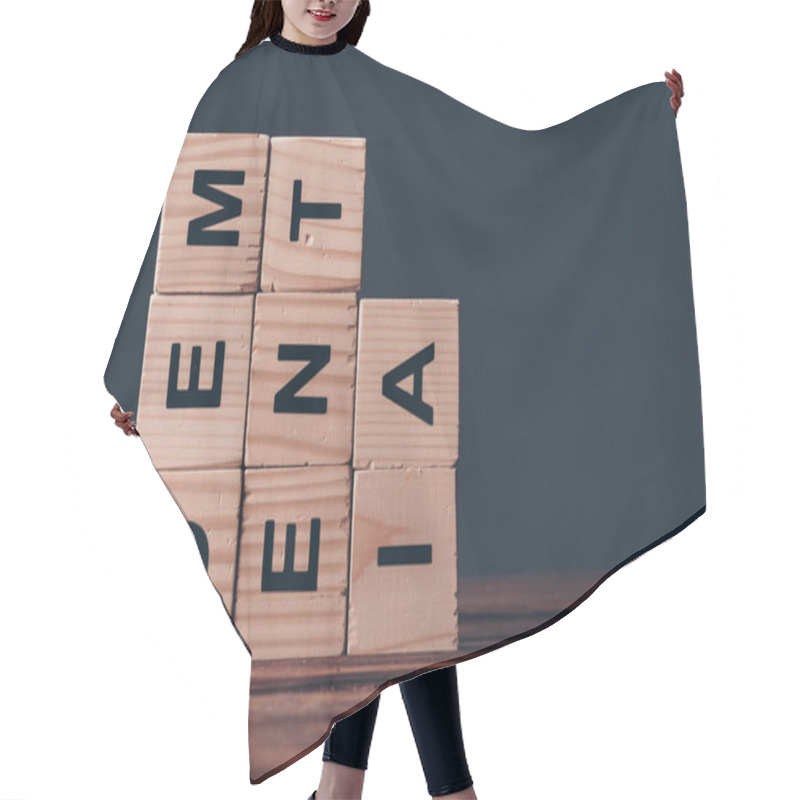 Personality  Cubes With Dementia Letters On Wooden Table On Black Background  Hair Cutting Cape