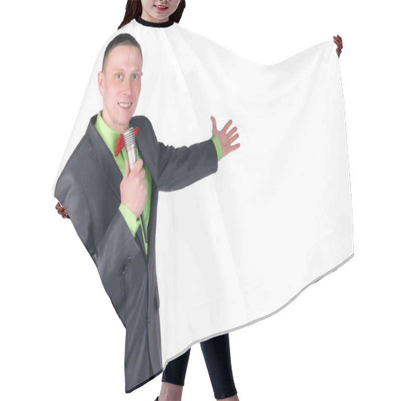 Personality  Happy Presenter Or Businessman With Microphone In The Hands Is Showing On A Copy Space Isolated On White Background. Hair Cutting Cape