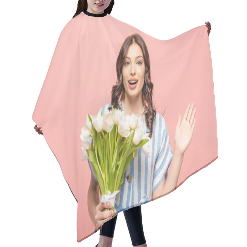 Personality  Excited Girl Waving Hand At Camera While Holding Bouquet Of White Tulips Isolated On Pink Hair Cutting Cape