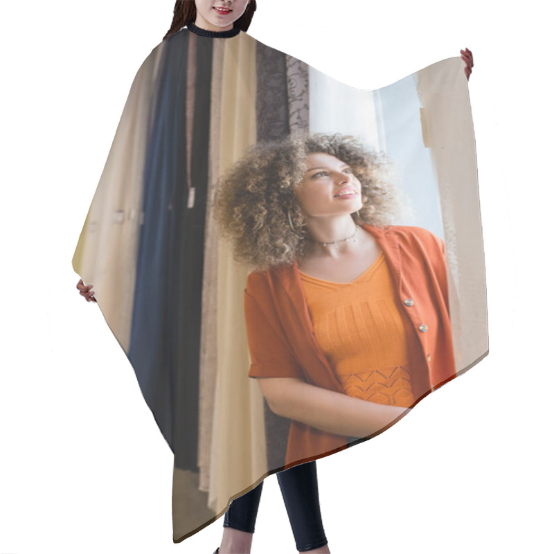 Personality  Happy Young Woman With Curly Hair Choosing New Curtains In Textile Shop Hair Cutting Cape