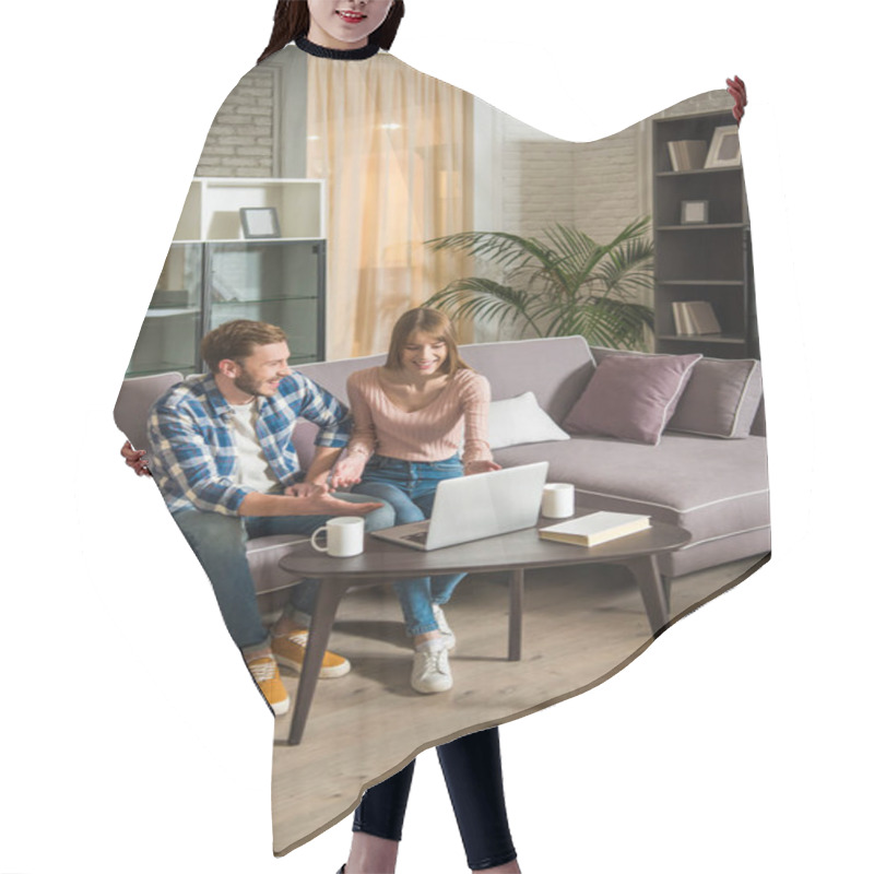 Personality  Front View Of Smiling Couple On Couch Using Laptop In Cozy Living Room Hair Cutting Cape