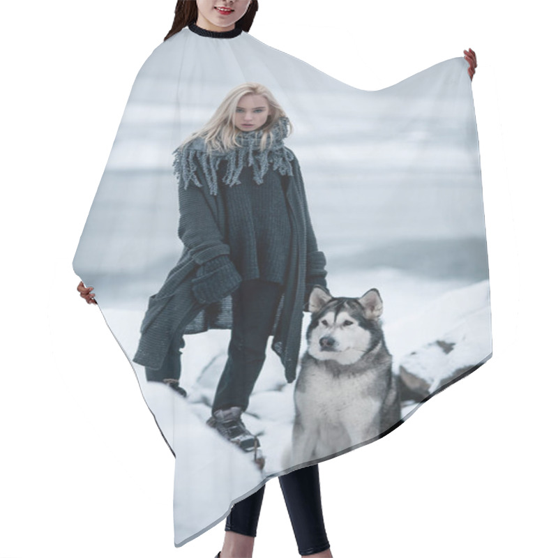 Personality  Girl With Dog Malamute Among Rocks In Winter.  Hair Cutting Cape