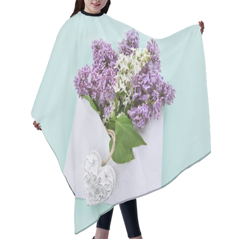 Personality  Flat Lay With White And Purple Lilac Blossoms In Envelope With A Heart On Mint Background  Hair Cutting Cape