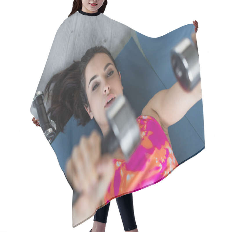 Personality  Top View Of Young Woman In Sportswear Lying On Fitness Mats And Doing Exercise With Dumbbells At Home Hair Cutting Cape