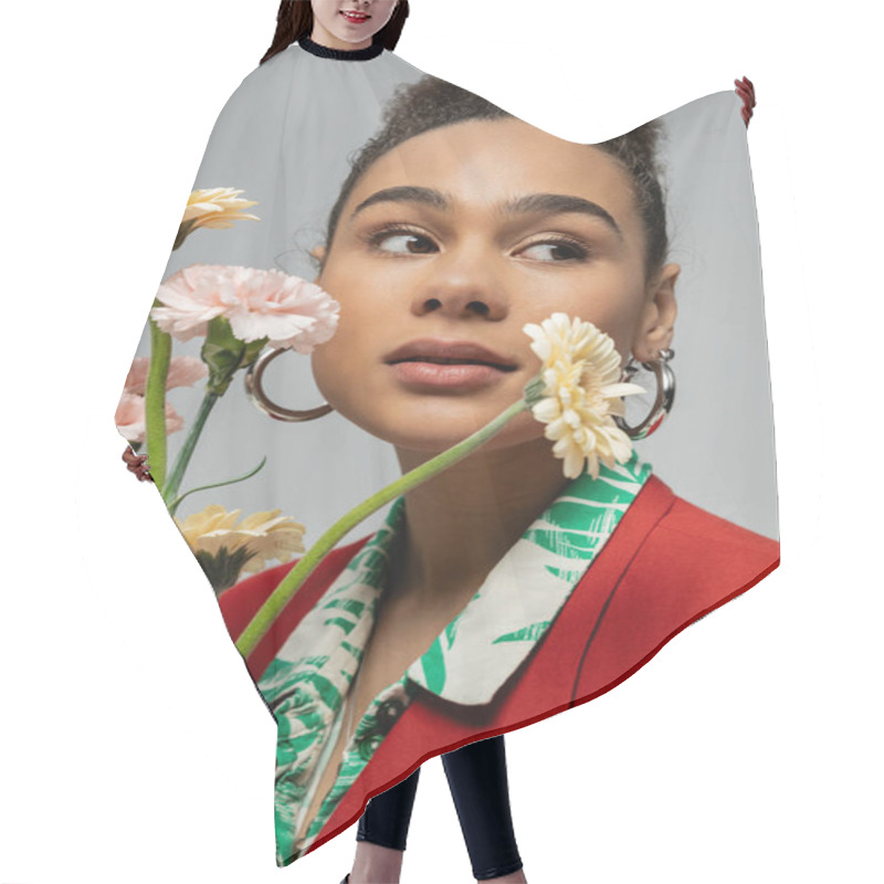 Personality  Close Up Portrait Of African American Woman In Red Blazer Holding Flowers On Grey Backdrop Hair Cutting Cape