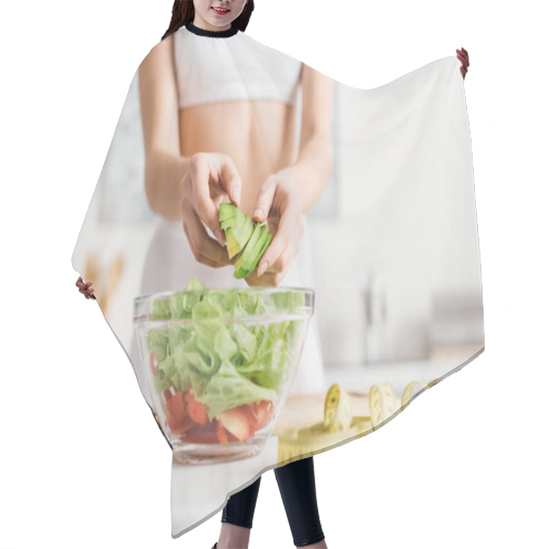 Personality  Cropped View Of Slim Woman Cooking Salad With Fresh Vegetables And Avocado Near Measuring Tape On Kitchen Table Hair Cutting Cape