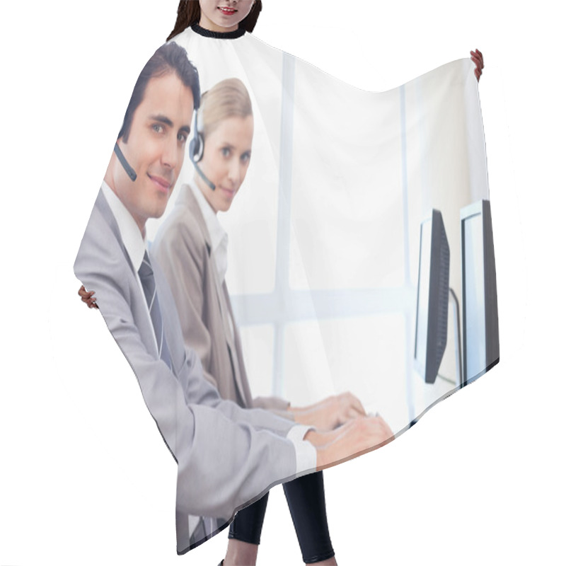 Personality  Operators Using A Monitor Hair Cutting Cape