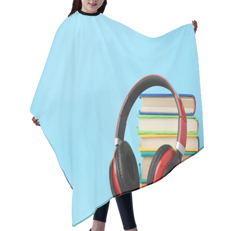 Personality  Books And Modern Headphones On Light Blue Background. Space For Text Hair Cutting Cape