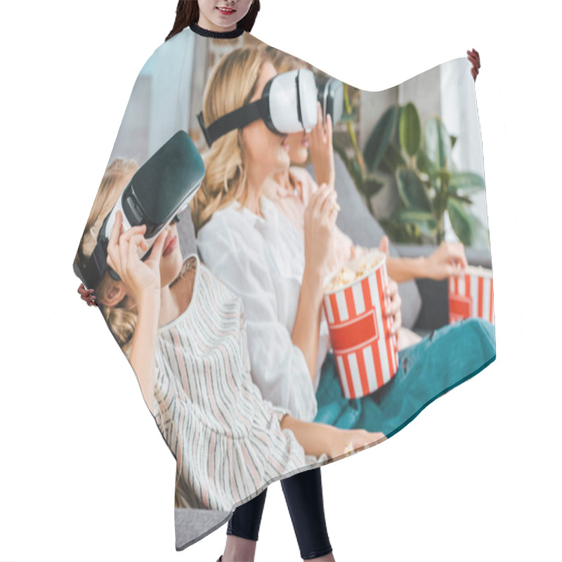 Personality  Little Child With Mother And Grandmother Sitting On Couch Together And Watching Movie With Virtual Reality Headsets At Home Hair Cutting Cape