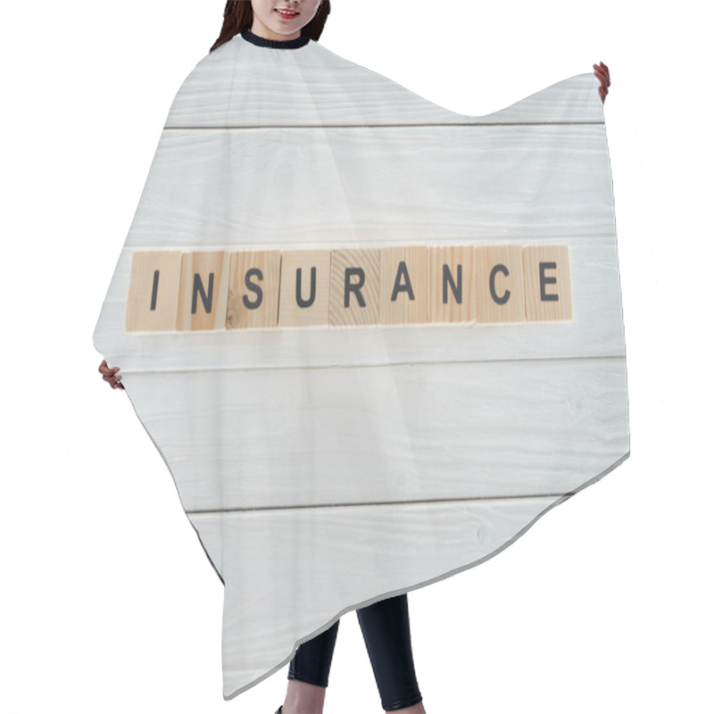 Personality  Top View Of Insurance Word Made Of Wooden Blocks On White Wooden Surface Hair Cutting Cape