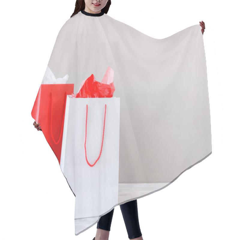 Personality  Presents On The Table With Paper Shopping Bags Hair Cutting Cape