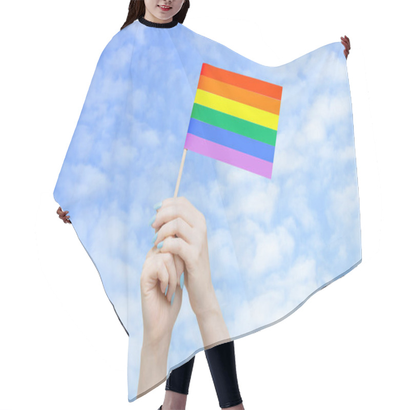 Personality  Flag LGTB In The Hands Of A Caucasian Woman Against The Sky With Clouds. Hair Cutting Cape