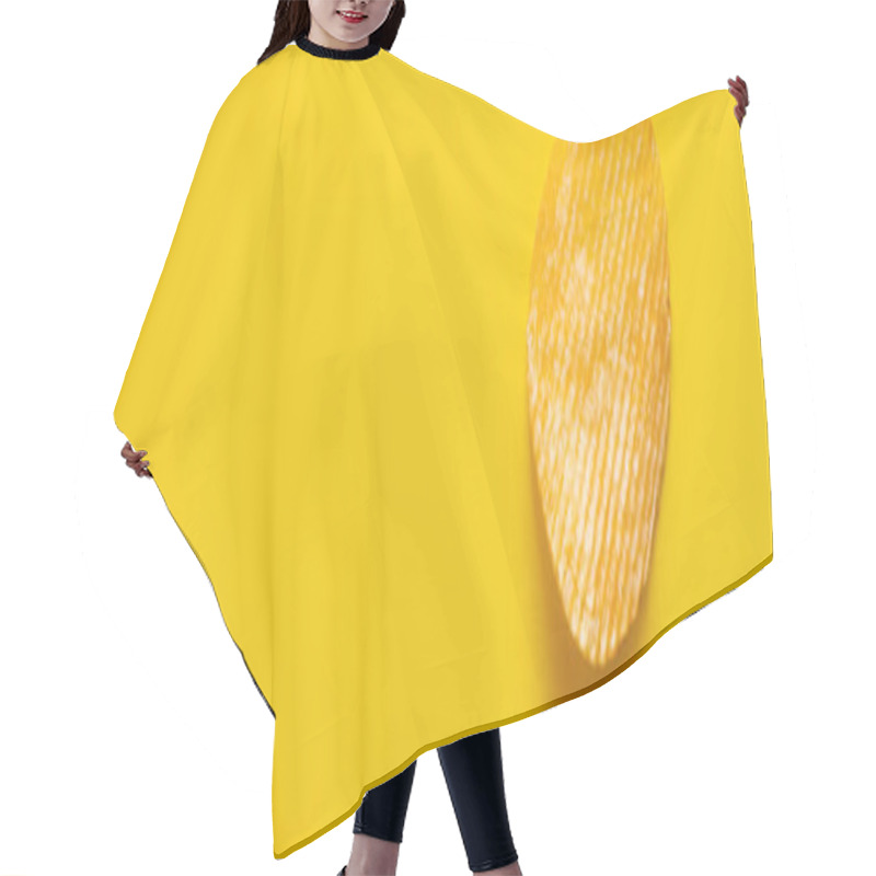 Personality  Top View Of Single Wavy And Salty Potato Chip On Yellow, Banner Hair Cutting Cape