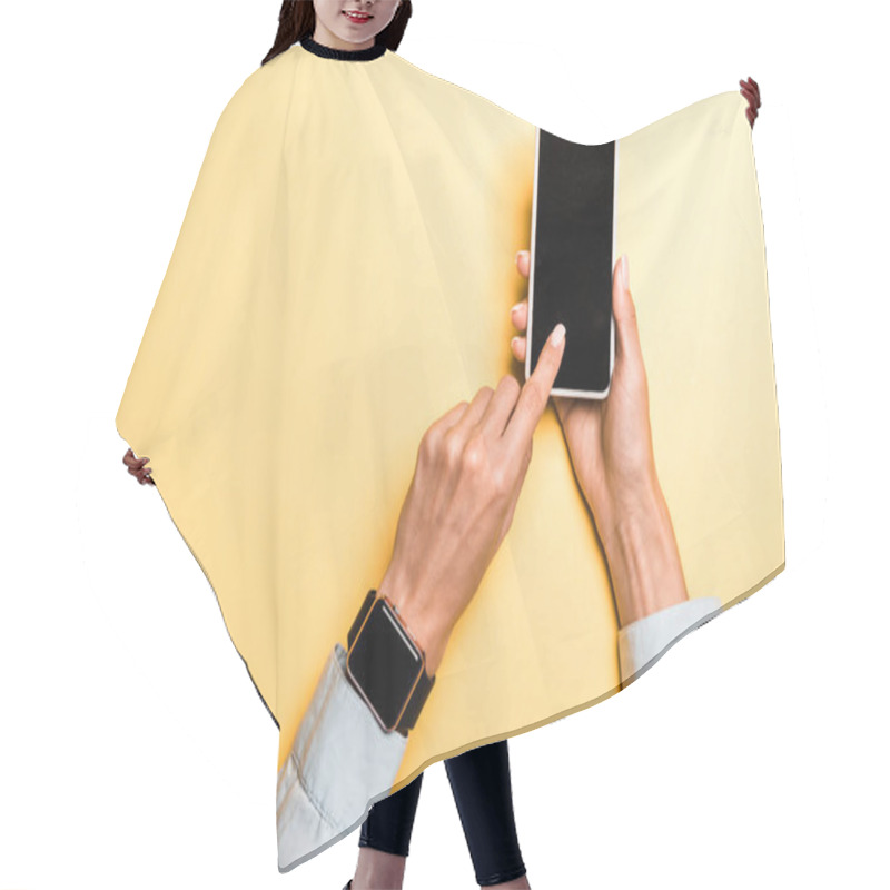 Personality  Cropped View Of Woman Pointing With Finger At Smartphone With Blank Screen On Orange Hair Cutting Cape