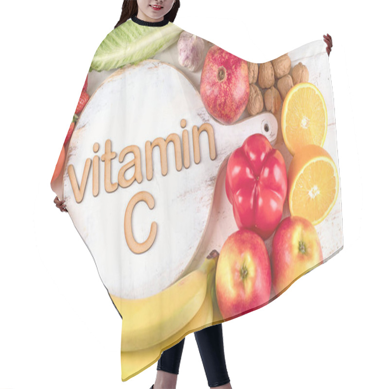 Personality  Vitamin C Rich Foods. Top View. Healthy Eating Concept Hair Cutting Cape