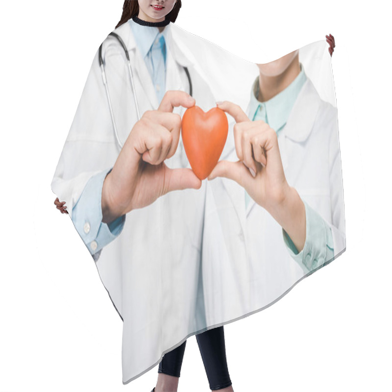 Personality  Cropped Image Of Young Doctors In Medical Coats Showing Heart Symbol Isolated On White Hair Cutting Cape